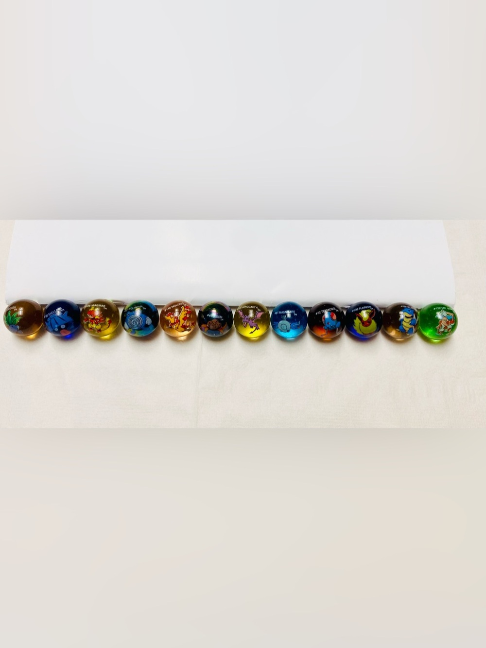 POKÉMON Marbles (Set of 12) Including Desired #09 Blastoise and #136 Flareon